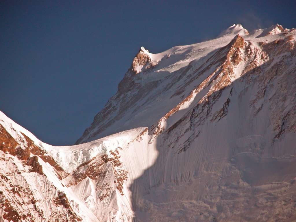 Manaslu 09 09 Manaslu From Bimtang Here�s another closer view from Bimtang of the summit plateau of Manaslu with the East Pinnacle (7992m) on the left and the summit to the right.